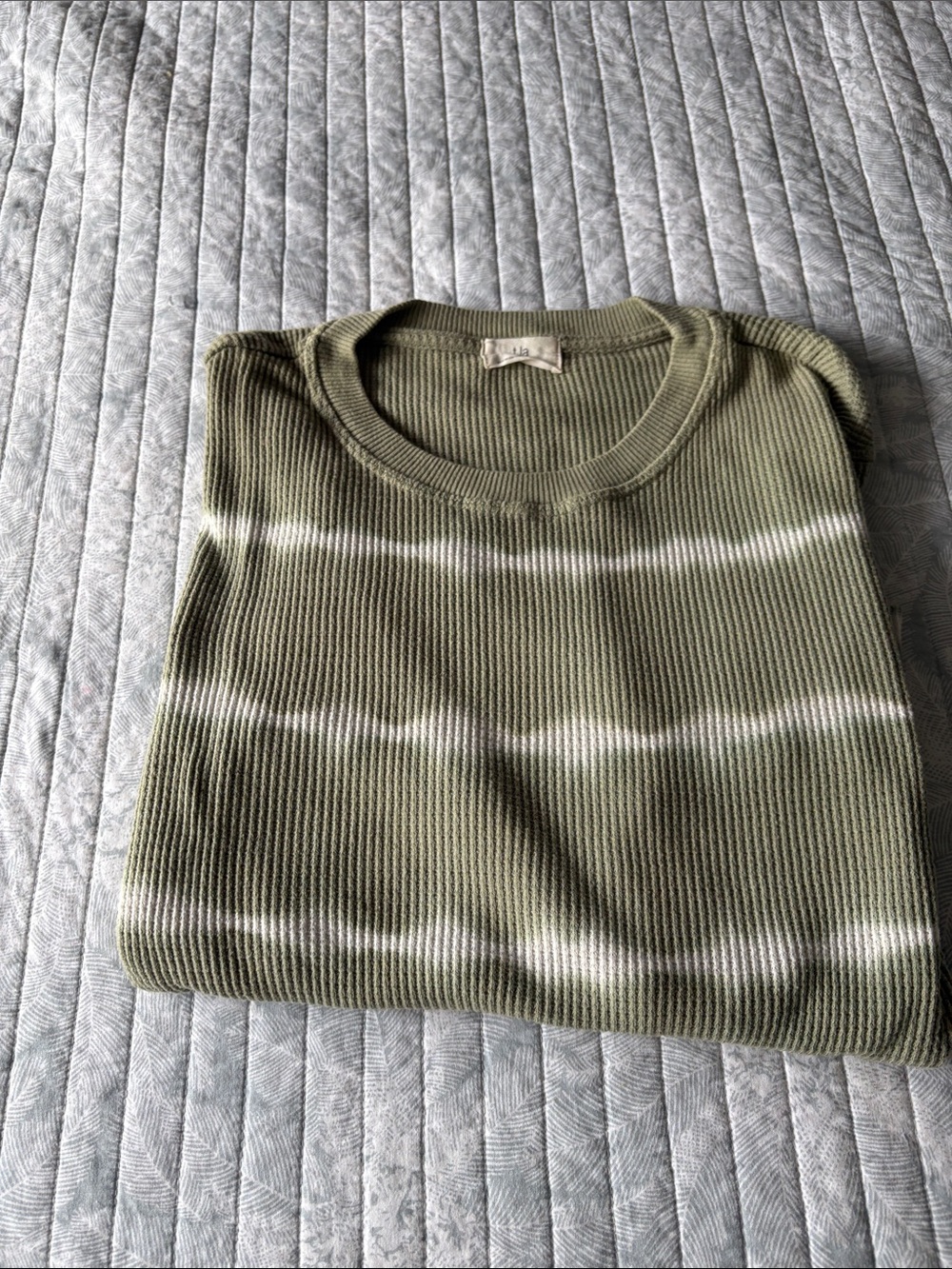 Women’s Olive Green Ribbed Crewneck Sweater with tye-dye accent.